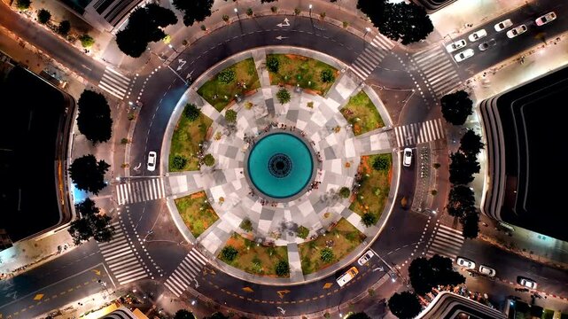 Top-down Aerial Night Time-lapse of Dizengoff Square Fountain and Traffic, Tel Aviv, Israel