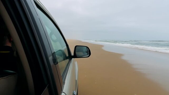 Sandwich Harbour in Namibia at the coast of the Atlantic Ocean. Sandy beach. Sandwich Harbor roundtrip daytime car tour