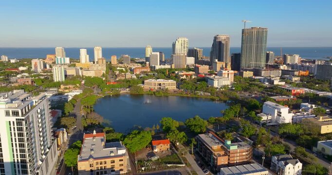 Mirror Lake in downtown district of St. Petersburg in Florida, USA. Urban area with contemporary high-rises, office towers and residential buildings.