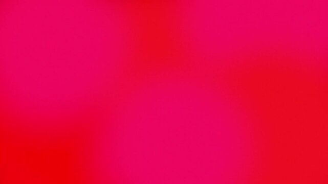 Pink and brown motion gradient background with smooth and soft movement.