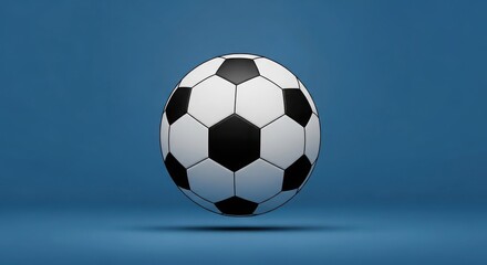 Fototapeta premium Classic Black and White Soccer Ball on Blue Surface