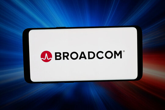 Stuttgart, Germany - 02-27-2026: In this photo illustration, the logo of US semiconductor company Broadcom Inc. is displayed on a smartphone in front of abstract background on computer screen.