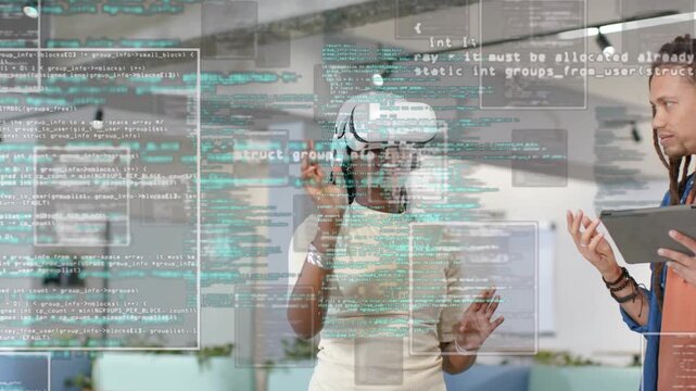 Woman with white VR headset raising hands opening code panels in tech demo, colleague using tablet