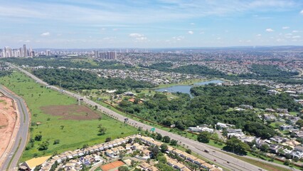 Obraz premium Aerial view of a luxury neighborhood in Goiania with fancy houses, restaurants and lots of nature near the racetrack. Goiania, Goias, Brazil 