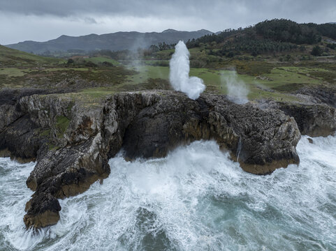 Aerial view of the Bufones de Pria where the sea explodes upwards through the karst formations, Llanes, Asturias, Spain.