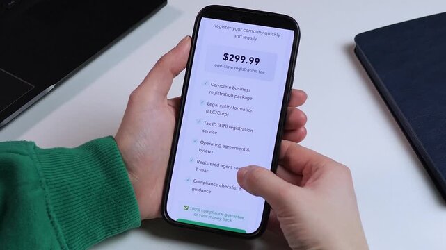 Start your company quickly. Mobile app interface for legal entity registration and business organization. Smooth scrolling to Register Your Organization button. High-quality footage for modern startup