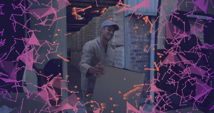 Worker grabbing box from van, carrying into warehouse past pillar with pink overlay obscuring view