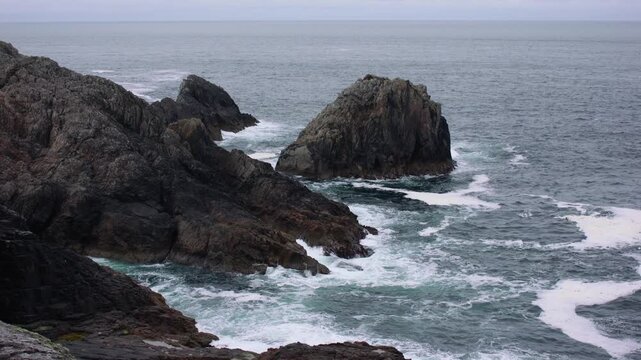 Rugged Cliffs and Powerful Atlantic Swell at Malin Head, County Donegal, Ireland