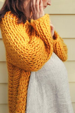Pregnant Woman in a cozy sweater
