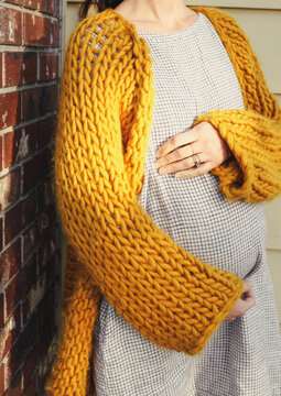 Pregnant Woman in a cozy sweater