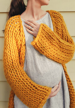 Pregnant Woman in a cozy sweater