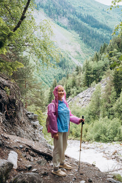 Family hiking trip in the mountains during nice weather
