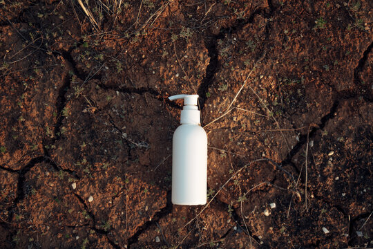 Cosmetic bottle on earth