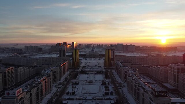 Drone flight above Astana city center with skyscrapers and Baiterek Tower. Capital of Kazakhstan, Qazaqstan