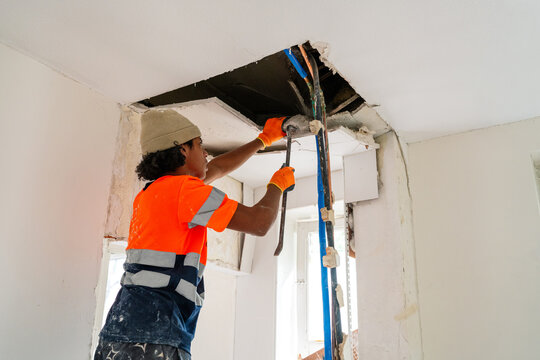Ceiling Demolition On Ladder
