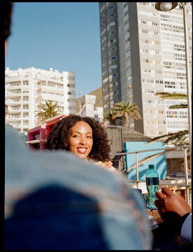 Woman smiling and enjoying time out with friends