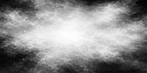 Fototapeta premium A dark and moody abstract background of swirling black and white smoke textures creates a dramatic storm cloudscape with motion and light