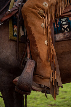 Close-Up Of Cowboy Boot On Western Saddle