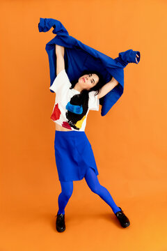 Dancer posing with blue blazer