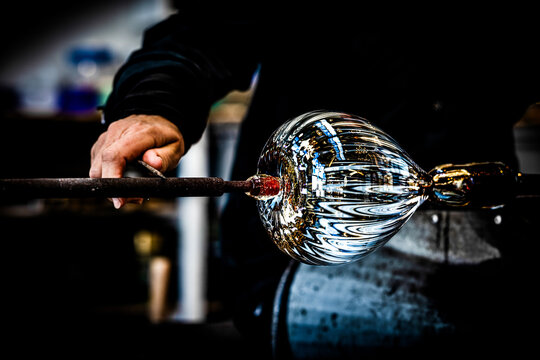 Glass blowing a vase

