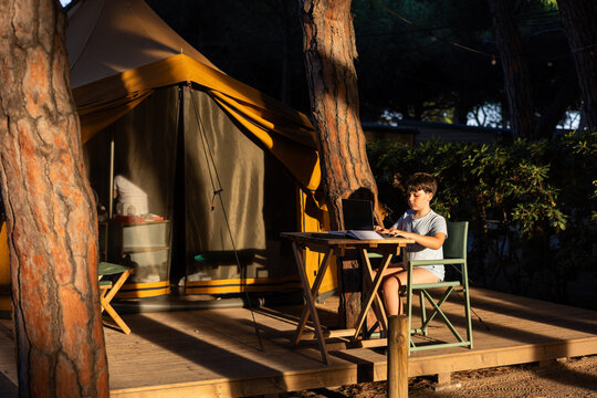 Image of a child with their laptop