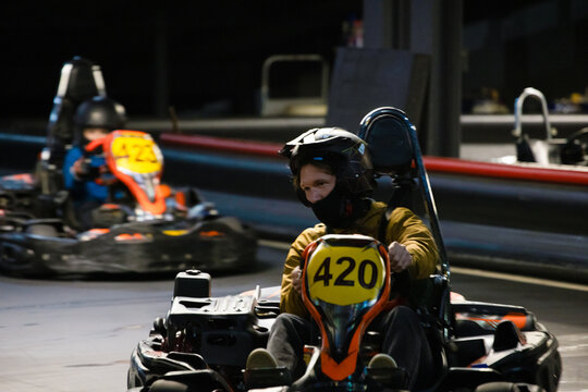 Two friends are kart racing