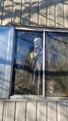 The Grim Reaper on the road in a mobile home