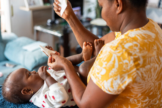 a woman changing diapers