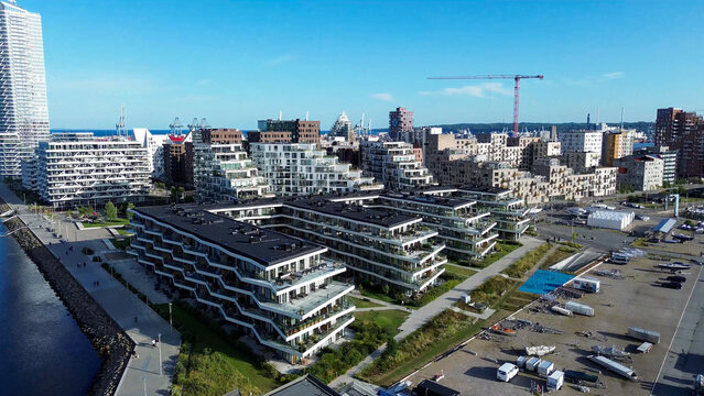 Modern buildings dot the Copenhagen harbor front.