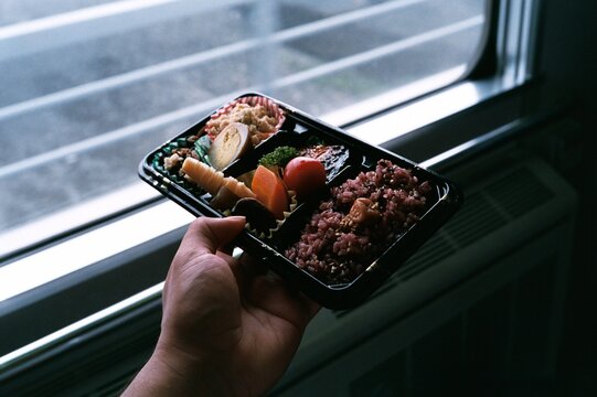 A bento box near a window
