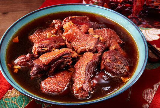 Closeup of braised chicken in rice wine on the table