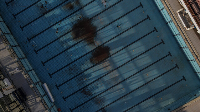 Aerial View of a Decaying Empty Swimming Pool