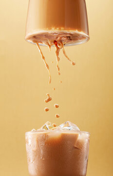 Two cups of Hong Kong-style milk tea that blend together harmoniously