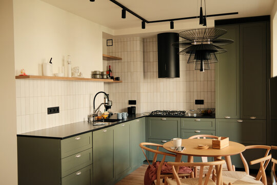Photo of cozy empty kitchen with warm tones, nobody present 