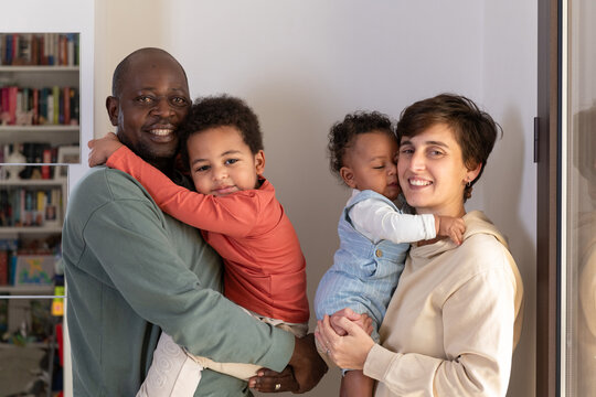 Modern family portrait showing love and togetherness indoors