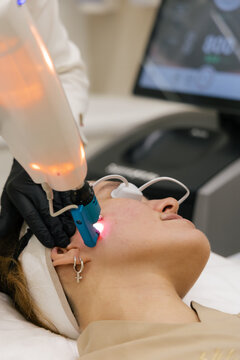 High-tech luminous skin procedure in beauty studio