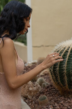 Woman exploring cactus 