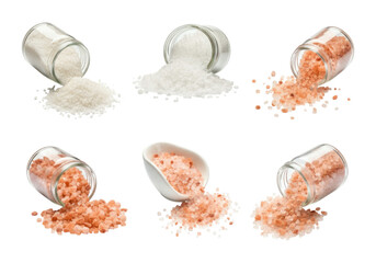 Assortment of white and pink salt crystals spilling from glass jars and a scoop on a transparent background