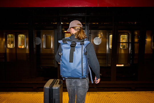 Man awaits the subway train