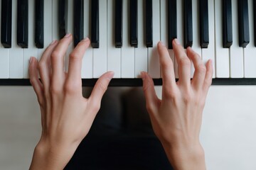 Female caucasian adult hands playing piano keyboard top view