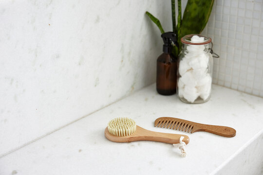 Natural Grooming Tools on Marble Counter