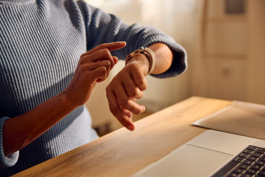 Busy woman checks the time