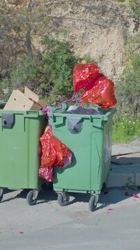 Heart shaped balloons discarded in trash bin
