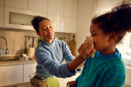 Mother takes care of her daughter