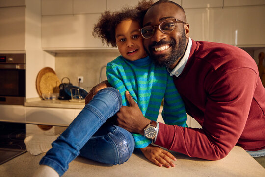 Excited father spends time with his kid at home