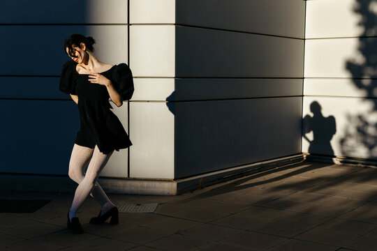 Woman with dramatic shadows