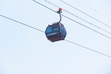 Busan Air Cruise, Busan cable car, ride on multicoloured sky capsule gondola route, with Songdo beach and Skywalk and Busan Bay panorama, South Korea, Songdo Station in a spring sunny day © tsuguliev