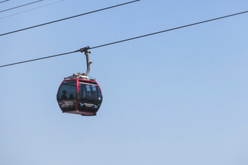 Busan Air Cruise, Busan cable car, ride on multicoloured sky capsule gondola route, with Songdo beach and Skywalk and Busan Bay panorama, South Korea, Songdo Station in a spring sunny day © tsuguliev