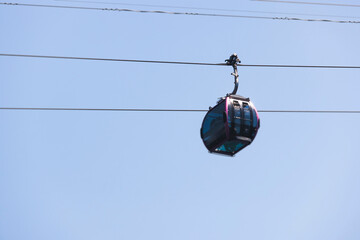 Busan Air Cruise, Busan cable car, ride on multicoloured sky capsule gondola route, with Songdo beach and Skywalk and Busan Bay panorama, South Korea, Songdo Station in a spring sunny day © tsuguliev
