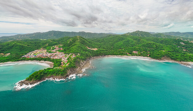 Aerial Drone View Separating Playa Danta And Playa Penca Beaches